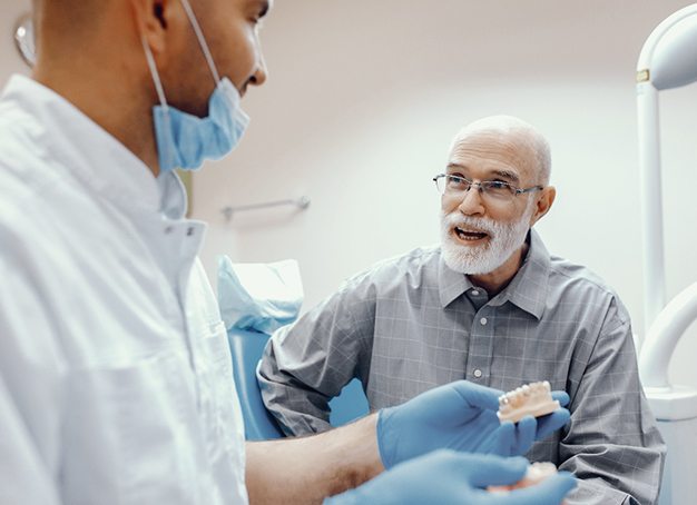 man at a dental implant consultation
