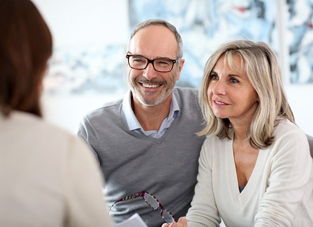 couple at a dental implant consultation