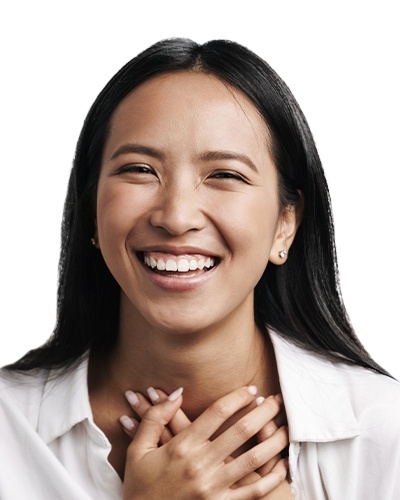 Woman laughing after preventive dentistry