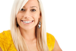 Woman with a beautiful smiles and braces