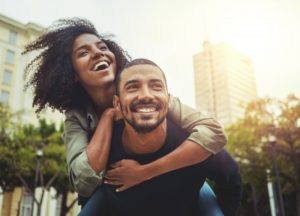 Couple with beautiful smiles after teeth whitening 