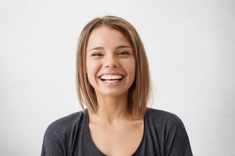 patient smiling with dental implants