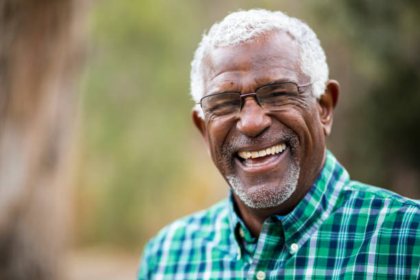 person wearing dentures smiling 