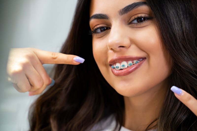 young person smiling with braces