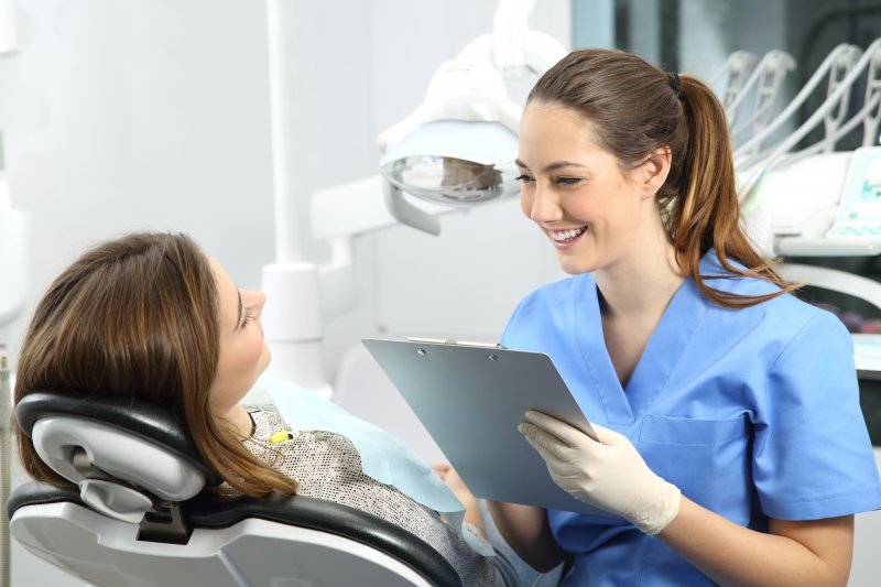 patient speaking to dentist about cosmetic dentistry