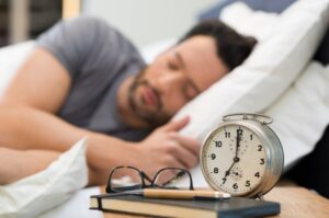 Man sleeping peacefully in bed