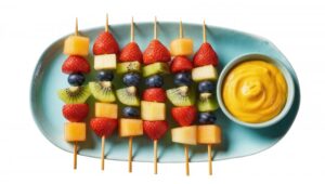 Fruit kabobs on a platter.