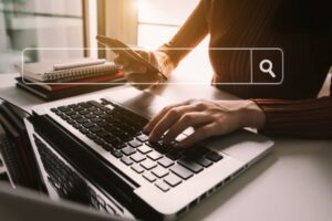Woman doing research on her computer 